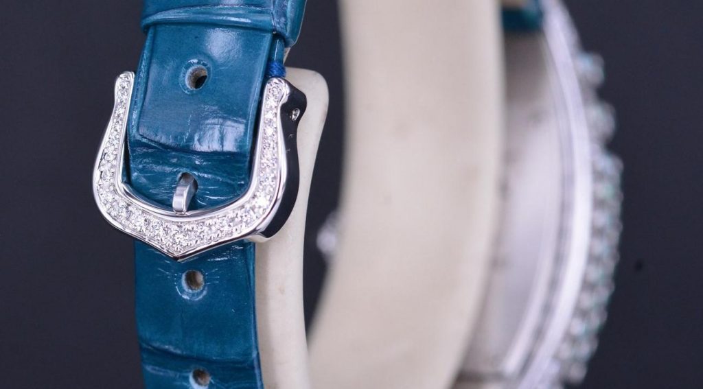 The female copy watches have green and blue leather straps.