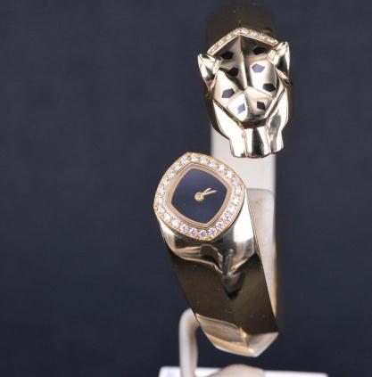 The female copy watch has a black dial.