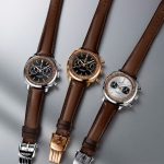 Silver black and red gold Breitling DB5 chronographs arranged side by side